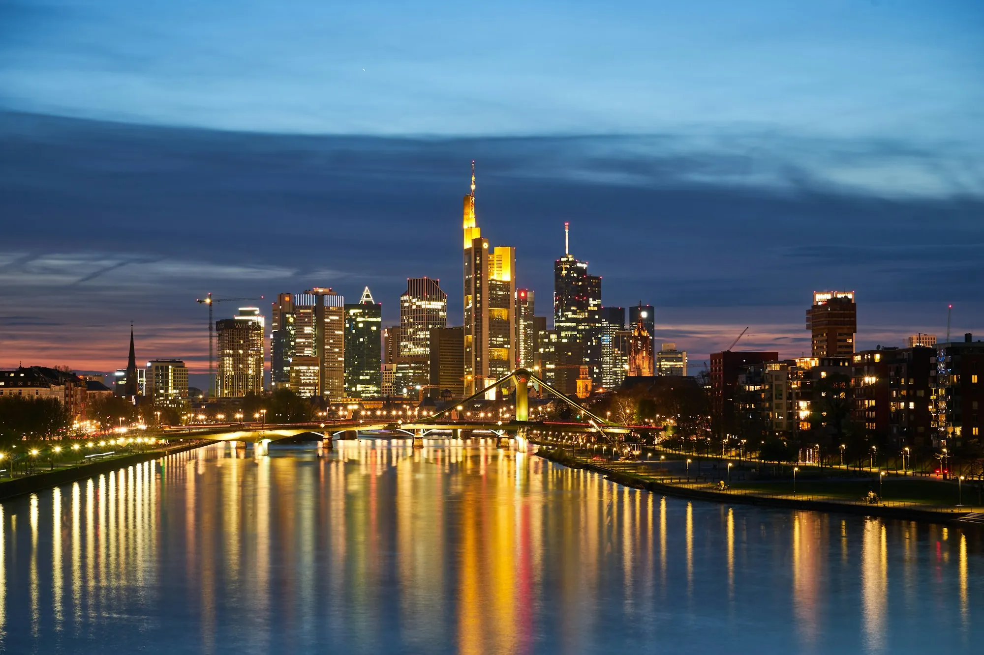 Frankfurt's skyline over the river at night